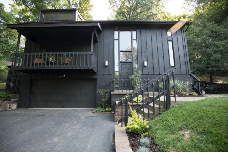 Black Home Exterior with Black Garage Door 
