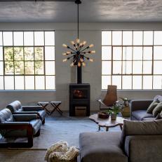 Gray Urban Living Room with Black Wood Stove 