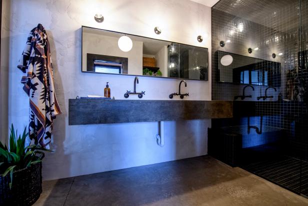 Gray Bathroom with Black Floating Sink and Mirror