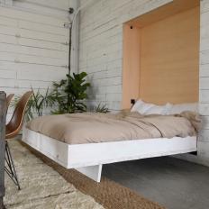 Neutral Rustic Guest Room with White Murphy Bed 
