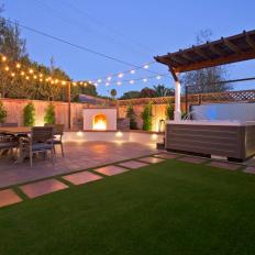 Expansive Outdoor Space With Hot Tub And Fireplace