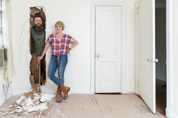 As seen on Home Town, Ben and Erin Napier are completely renovating the Keller residence in Laurel, Mississippi. Ben and Erin (C) work to open up the wall between the bedroom and the room that will become a large bathroom for the Kellers. (portrait)