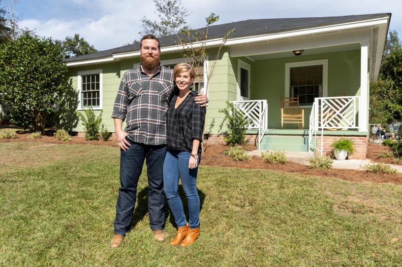 As seen on Home Town, Ben and Erin Napier have completely renovated the Keller Residence in Laurel, Mississippi.  The dreary white paint and large porch awning has been removed.  New paint, landscaping and porch railings now brighten the exterior of the house. (portrait)