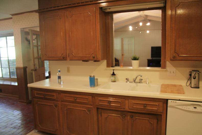 Before the renovation, the kitchen was small, cramped, outdated, and out of focus.
