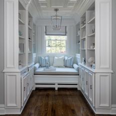 Traditional Reading Nook with Built-In Shelving and Seating