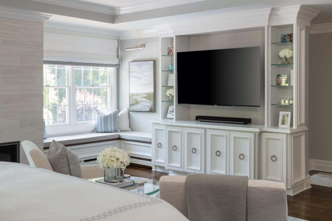 White Contemporary Master Bedroom With Entertainment Center