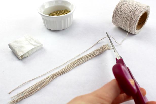 Cut baker's twine to size to make tea bags for your mom this Mother's Day.