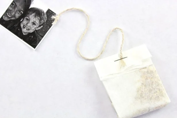 A DIY tea bag featuring Mom's favorite photos is the perfect gift for Mother's Day.