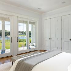 White Bedroom With Sliding French Door