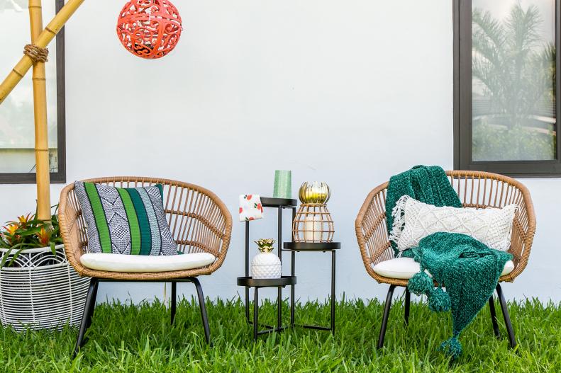 We love good-looking, weather-resistant furniture. This pair of chairs is wide, comfy and adds a little tropical flair to any outdoor setup. 