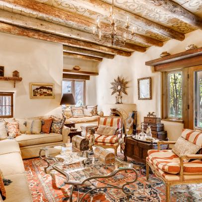 Southwestern Living Room With Wood Beams, Painted Ceilings