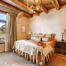 Southwestern-Style Guest Bedroom With Carved Nightstands