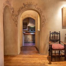 Adobe-Style Archways Connect Dining Room to Kitchen