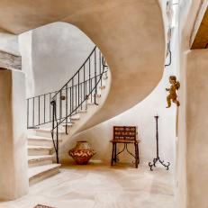 Southwestern Foyer Includes Spiral Staircase, Hand Troweled Plaster Walls