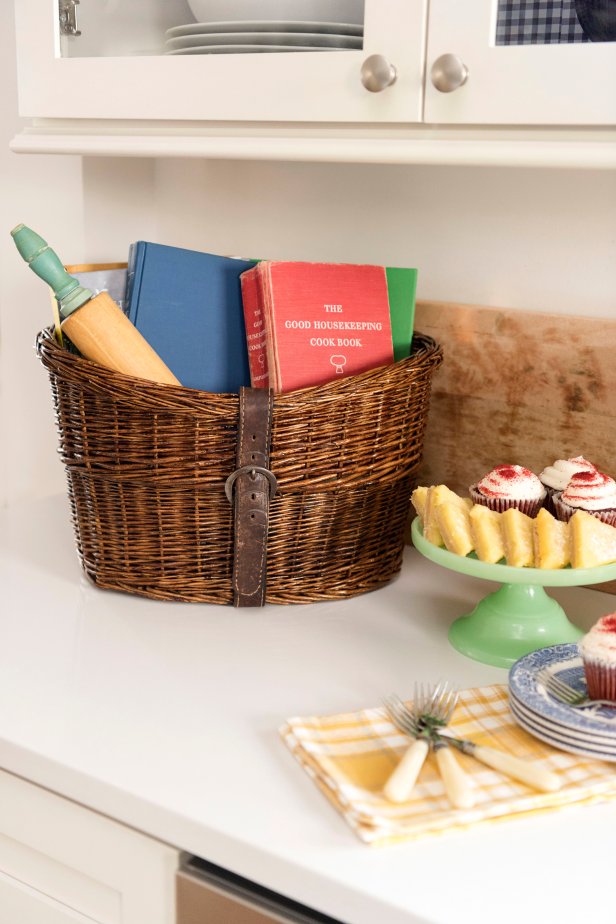 Give a new basket old-school charm with a leather belt and dark stain, then use it to handily corral cookbooks in your kitchen.
