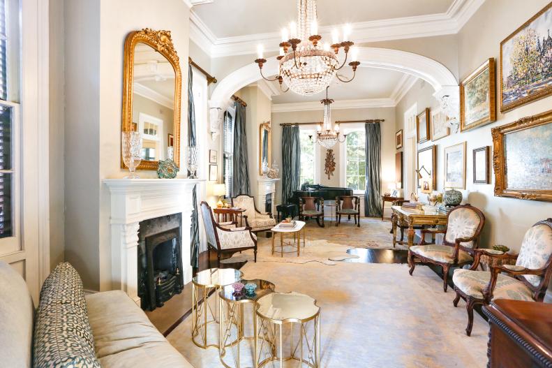 Large Living Room With High Ceilings, Crown Molding and Antique Chairs