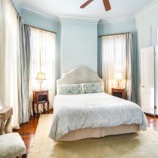 Blue Toned Master Suite With Bay Windows