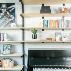 Built-In Bookshelf and Black Piano