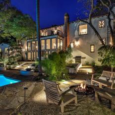 Mediterranean Villa Includes Fire Pit Spot in Backyard