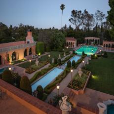 Manicured Gardens and Tiered Swimming Pools at Mediterranean-Style Estate