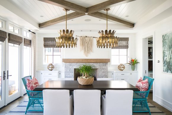 Eclectic Dining Room With Blue Chairs