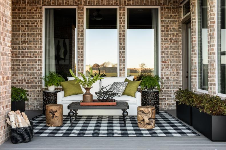 Brick Porch With Gingham Rug