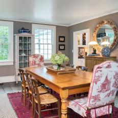 Pink Chinoiserie Chairs, Area Rug Enliven Eclectic Dining Room