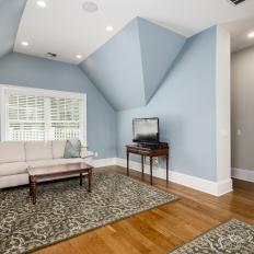 Blue Transitional Sitting Room With Sloped Ceiling