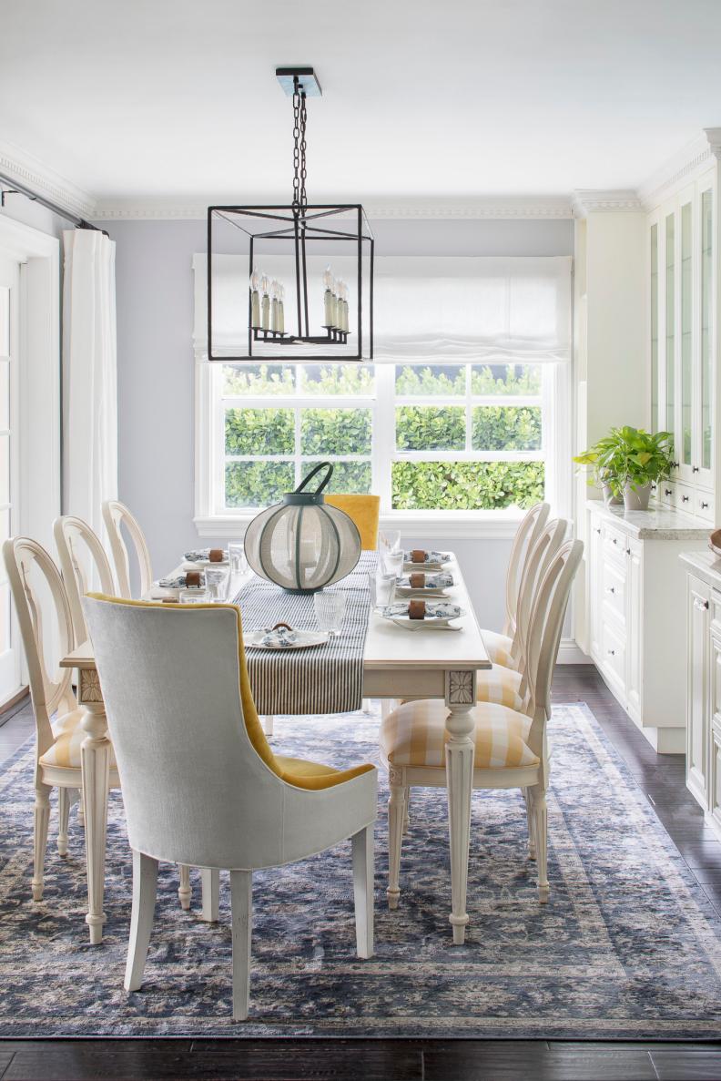 Bright Dining Space With Large Table For Eight And Modern Chandelier 