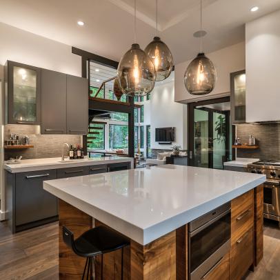 Neutral Chef Kitchen With Smoky Glass Pendants