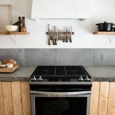 Neutral Craftsman Kitchen with Gray Concrete Counterops 