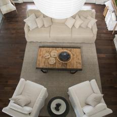 Neutral Craftsman Great Room with Brown Coffee Table and  Hardwood Brown Floor