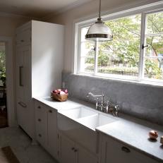 Contemporart White Kitchen with Gray Marble Countertops 