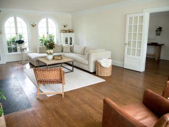 Neutral Living Room with a Hardwood Brown Floor, White Sectional 