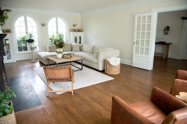 Neutral Living Room with a Hardwood Brown Floor, White Sectional 