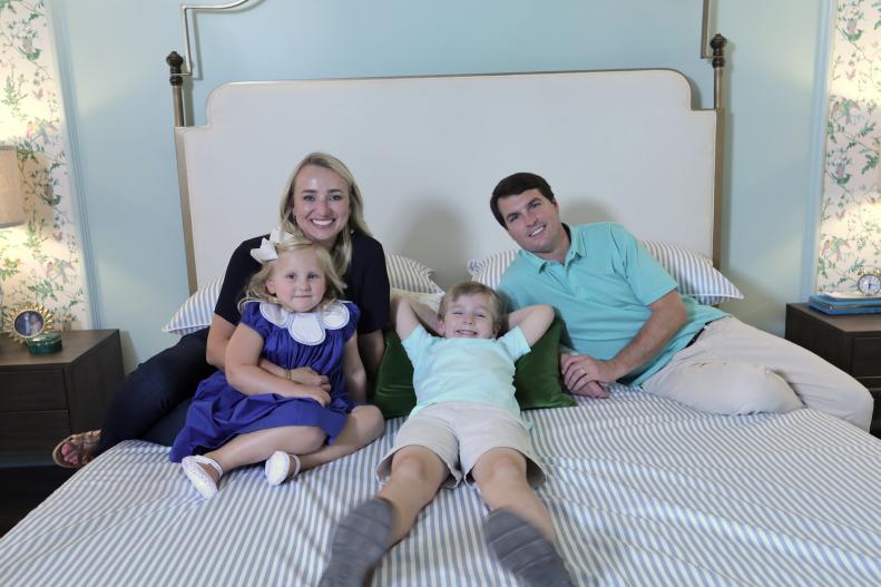 The Holt family enjoying their cozy new master bedroom