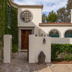 Mediterranean-Style Home Features Private Courtyard Entrance