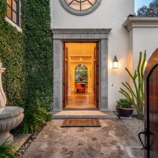 Private Mediterranean-Style Entry Courtyard Includes Fountain, Climbing Vines 