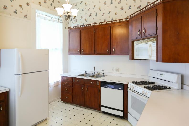 The Luker kitchen cabinets and countertops need renovation to modernize the space on Home Town. (Before 3)