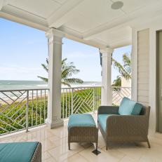 Oceanfront Porch With Blue Armchair