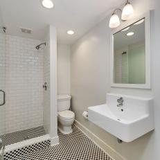Small Bathroom With Black-and-White Checkered Floor