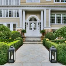 Hedges, Stone Walkway Create Formal Entrance to Greek Revival Home
