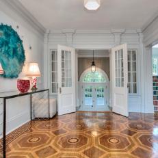 Stunning Transitional Foyer With Patterned Hardwood Floors