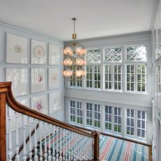 Transitional Landing Comes to Life With Gallery Wall, Striped Runner