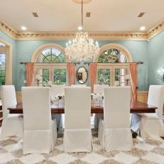 Formal Dining Room Fit For Royalty With Gold-Trimmed Ceiling