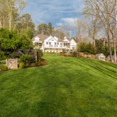 Gently Sloping Lawn Features Private, Fenced-In Garden