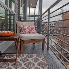 Industrial-Style Balcony Softened By Cushioned Chair, Accent Rug