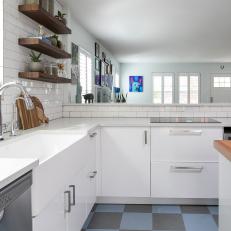 White Open Plan Kitchen With Wood Shelves