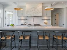 Marble Range Hood in Modern Kitchen with Four-top Island