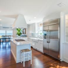 White Open Plan Kitchen With Water View
